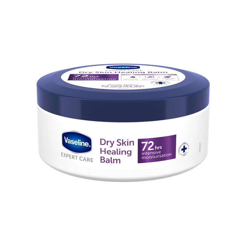 Round white container with a blue lid labeled "Vaseline Expert Care Dry Skin Healing Balm," featuring "250 ml" and "72 hrs intensive moisturisation" prominently displayed.