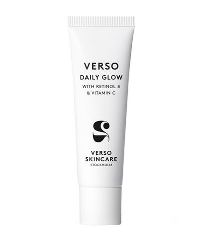White tube featuring "VERSO DAILY GLOW" in bold black text, with details about retinol 8 and vitamin C, and the Verso Skincare logo prominently displayed.