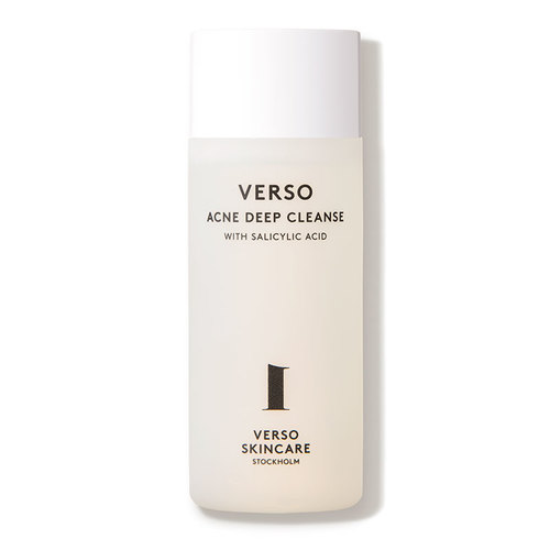 Clear bottle of VERSO SKINCARE Deep Cleanse, featuring a minimalist design with a white cap, black text, and a logo, highlighting its salicylic acid formula for acne treatment.