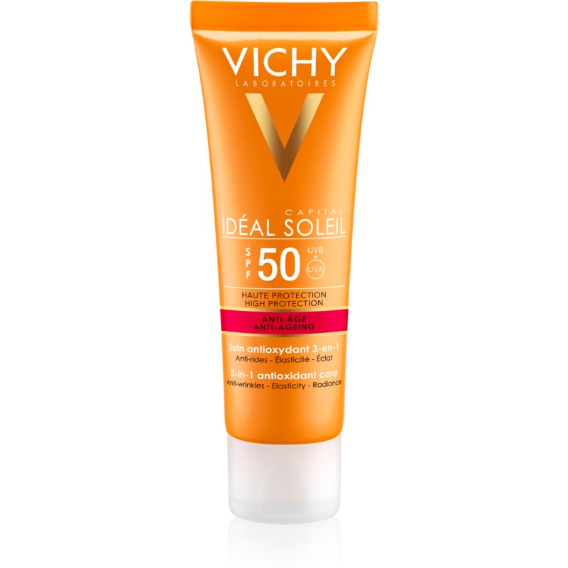 Vichy Capital Soleil Anti-Ageing 3-in-1 sunscreen tube, 50ml, featuring an orange design with white text, highlighting SPF 50, rejuvenating properties, and ingredients like black tea and vitamin E.