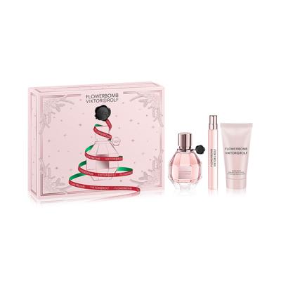 Viktor & Rolf Flowerbomb gift set featuring a pink floral-shaped EDP bottle, a miniature EDP, and a body lotion, all presented in a decorative pink box with festive ribbon design.