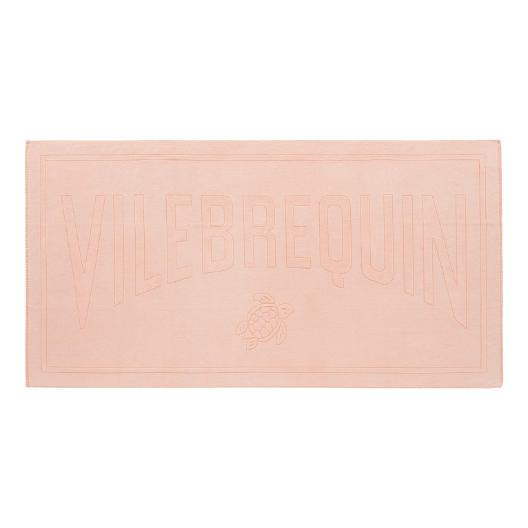Cotton beach towel in natural mineral dye, featuring a soft sand and orange hue, with "VILEBREQUIN" embossed and a turtle logo at the bottom, size OSFA.