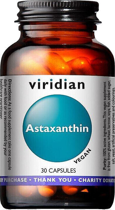 Brown glass bottle with a black lid, labeled "Viridian Astaxanthin Vegan Caps 30" featuring a turquoise circle, white text, and a note about charity donations.