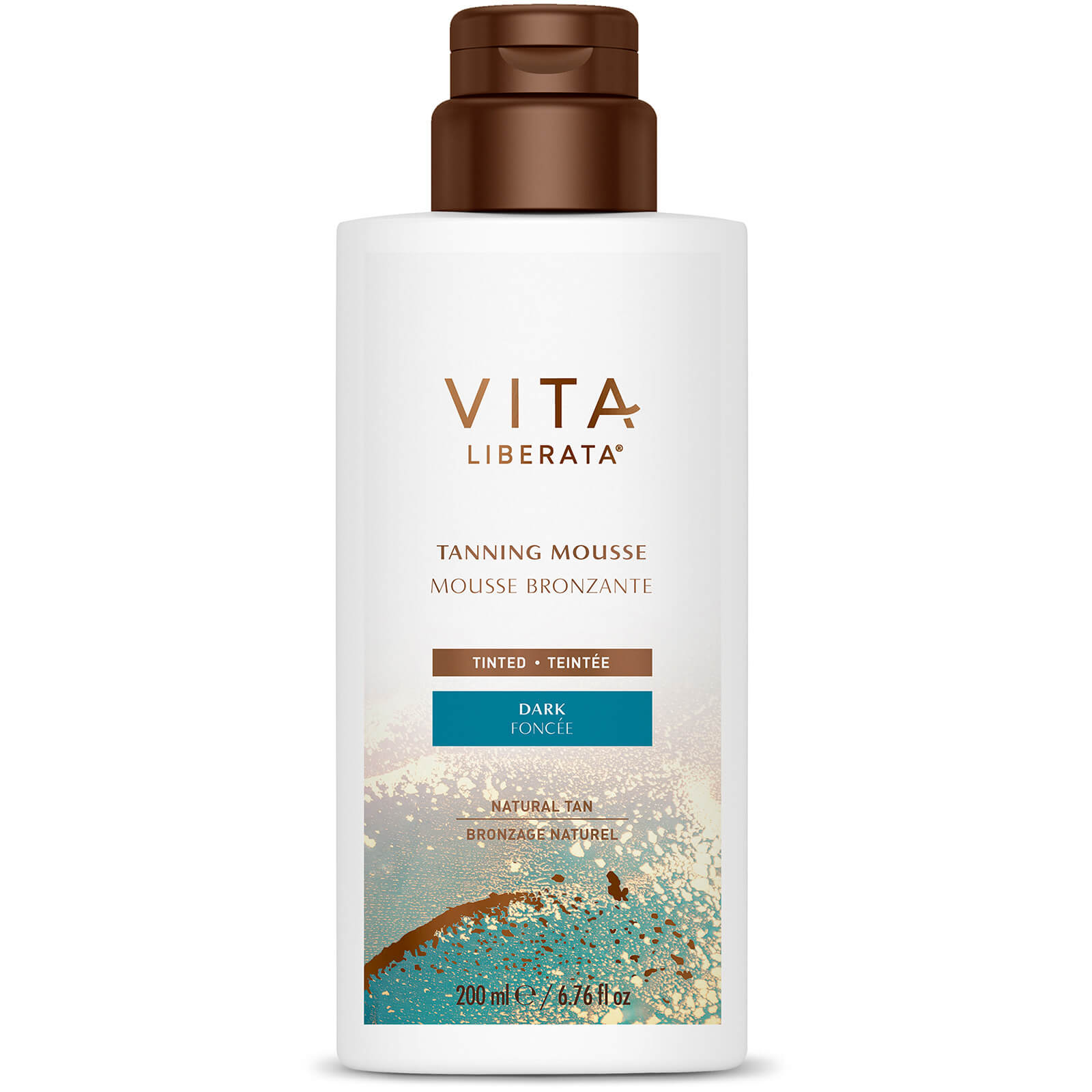 White bottle with a brown pump top, featuring a gold and teal label that reads "Vita Liberata Tinted Tanning Mousse - Dark," 200 ml size, emphasizing a natural tan.