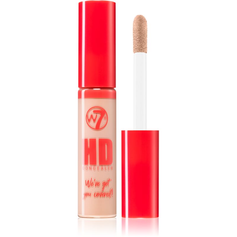 W7 HD Concealer in Light Warm features a clear tube with a vibrant red cap, a sponge applicator, and the brand logo prominently displayed on the front.