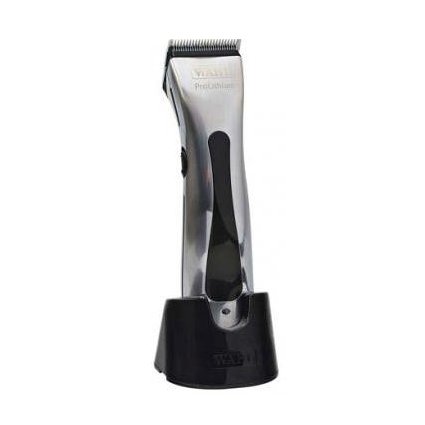 Cordless hair clipper with a sleek silver body, black accents, and a detachable blade, resting in a black charging stand, showcasing its modern design and ergonomic shape.
