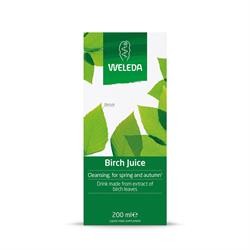 Green and white packaging featuring birch leaves, labeled "Weleda Birch Juice 200ml," emphasizing its cleansing properties for spring and autumn.