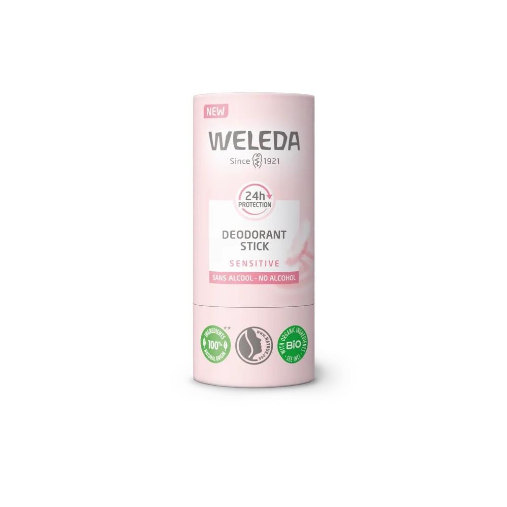 Weleda Deodorant Stick Sensitive in a pink cylindrical container, featuring a white label with green certification symbols, promoting 24-hour protection and alcohol-free formula.