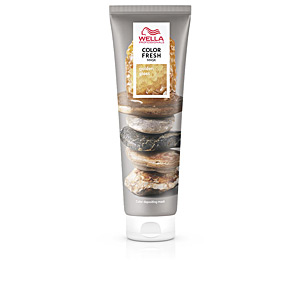 Wella COLOR FRESH Mask #golden Gloss in a silver tube featuring a golden label, with a textured background of stacked hair products.