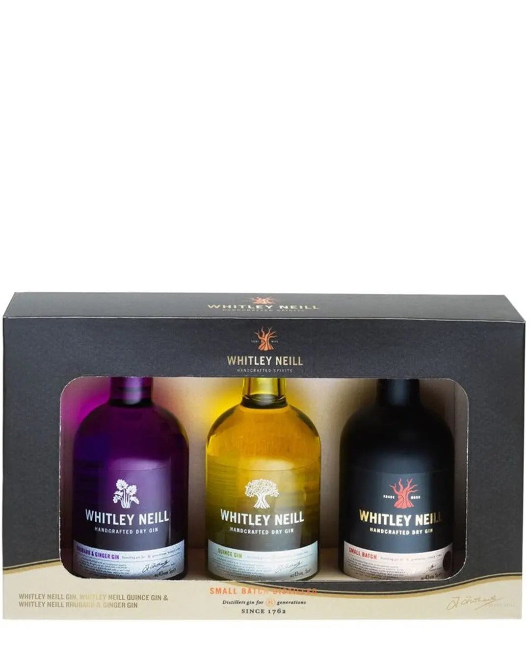 Three miniature gin bottles in a gift set: a purple bottle labeled "Whitley Neill Blackberry," a yellow bottle labeled "Whitley Neill Original," and a black bottle labeled "Whitley Neill Rhubarb & Ginger," displayed in a sleek black box.
