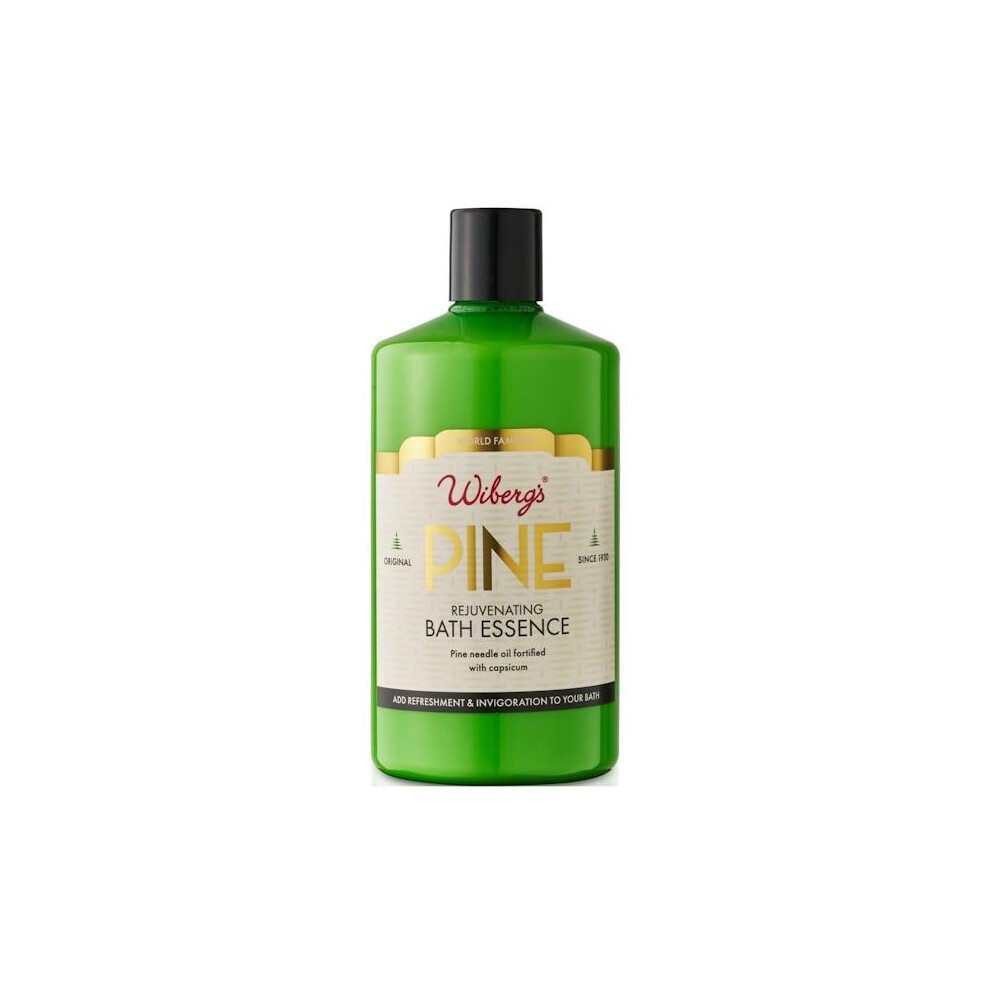 Green plastic bottle of Wiberg's Pine Bath Essence, 300ml, featuring a white and gold label with text highlighting its rejuvenating properties.
