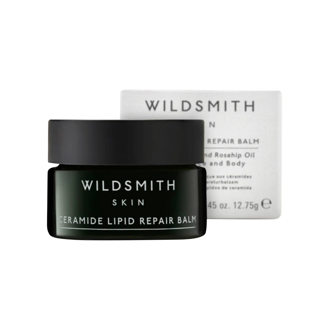 Black glass jar with a black lid labeled "WILDSMITH SKIN CERAMIDE LIPID REPAIR BALM" next to a white box featuring the same text and product details.