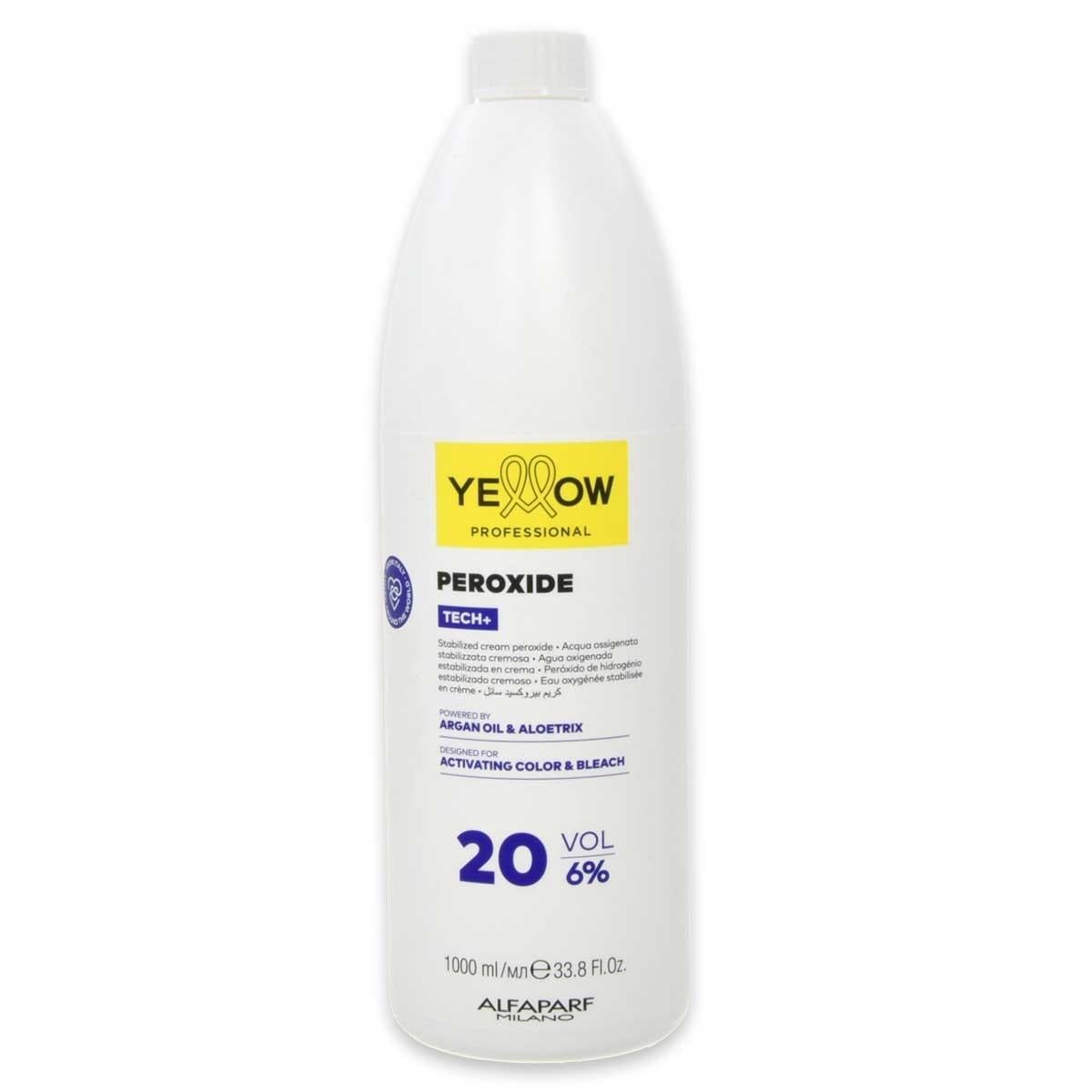 White plastic bottle with a yellow and blue label, containing 1000ml of 20 Vol peroxide by Alfaparf Yellow Professional, featuring argan oil and aloes.
