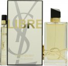 Yves Saint Laurent Libre Eau De Parfum set featuring a gold-accented box, a clear glass bottle with a black cap, and a travel-sized spray vial.