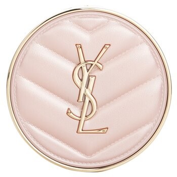 Round cushion compact in soft pink with a quilted texture, featuring a gold YSL logo on the front, designed for high coverage foundation in shade No.BR20 Cool Ivory.