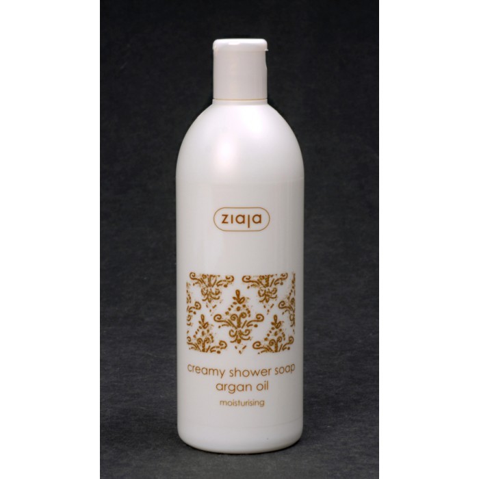 Off-white bottle of Ziaja Argan Oil Creamy Shower Gel, featuring a gold decorative label and a white pump top, with a capacity of 500ml and moisturizing properties.