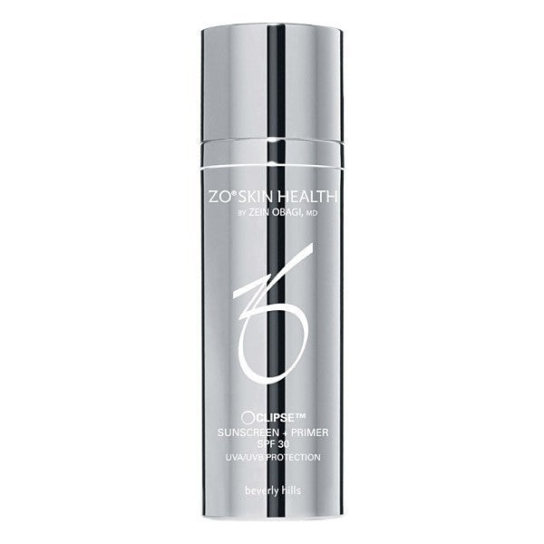 Silver cylindrical bottle with a sleek design, labeled "ZO Oclipse Sunscreen + Primer SPF30," featuring a pump dispenser and a minimalistic aesthetic.