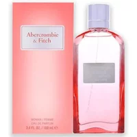 Pink Abercrombie & Fitch perfume bottle with silver cap and label, next to matching pink box.