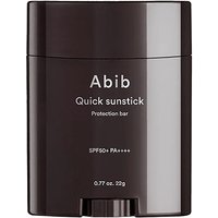 Abib Quick Sunstick Protection Bar SPF 50+, sleek black container, 22g, with white text detailing.