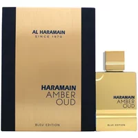 Gold Al Haramain Amber Oud Bleu Edition perfume bottle with matching box, featuring bold black text and sleek design.