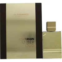 Al Haramain Amber Oud Gold Edition perfume, 60ml, in a gold rectangular bottle with a matching gold cap and box.