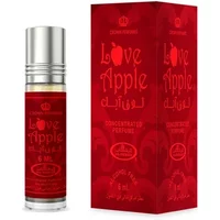 Red Al-Rehab Love Apple Roll-On Oil 6ml with silver cap, matching red box with apple graphic and Arabic script.