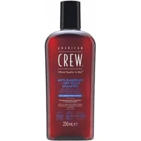 American Crew Anti-Dandruff Dry Scalp Shampoo 250ml in a dark amber bottle with black cap and white text.