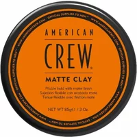 American Crew Matte Clay 85g in a round black container with orange label and bold black text.