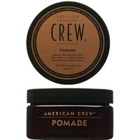 Brown jar of American Crew Pomade with black lid and brown label, 50g size.