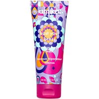 Purple and pink tube of Amika Bust Your Brass Cool Blonde Intense Repair Hair Mask, 100ml, with colorful geometric design.