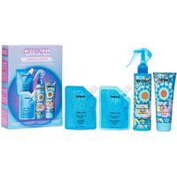 Amika hydration set with blue bottles, floral designs, includes spray, shampoo, conditioner, and colorful packaging.