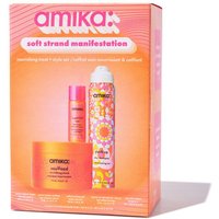 Amika gift set with colorful shampoo, conditioner, and spray in orange and pink packaging with floral designs.