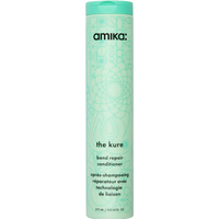 Mint green cylindrical bottle of Amika The Kure Bond Repair Conditioner, 275ml, with floral design and black text.