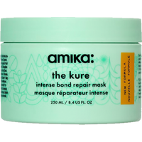 Amika The Kure Intense Bond Repair Mask, 250ml mint green jar with bold black text and orange accent label.