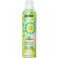 Amika Un.done Volume Matte Texture Spray, 192ml, in a green can with colorful floral patterns.