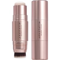 Rose gold stick highlighter with retractable brush and cap, labeled "Anastasia Beverly Hills" in sleek metallic finish.
