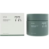 ANUA Heartleaf 77% Clear Toner Pad in green jar, 70 pads, with matching box displaying product name and percentage.