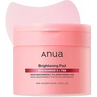 Pink ANUA Niacinamide 5 TXA Brightening Pad container with 60 pads, white lid, and bold black text.
