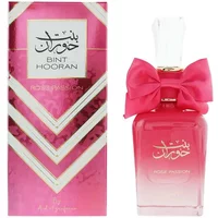 Pink Ard Al Zaafaran Bint Hooran Rose Passion Eau De Parfum 100ml with gold accents and a large pink bow.