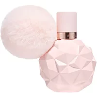 Pink faceted perfume bottle with a fluffy pom-pom, labeled "ARIANA GRANDE Sweet Like Candy Eau De Parfum 30ml."