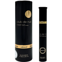 Black cylindrical bottle with gold accents, labeled "Club de Nuit Intense Women," next to matching black box.