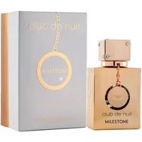 Gold Armaf Club De Nuit Milestone perfume oil bottle with square cap, beside a matching gray and gold box.