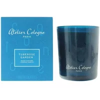 Blue Atelier Cologne Tuberose Garden Candle 180g in a sleek glass jar with matching blue box featuring white text.