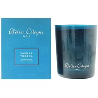 Blue Atelier Cologne Vanille Tribeca candle in glass holder with matching blue box, featuring elegant white text.