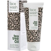 White tube of Australian Bodycare Face Wash 100ml with leaf pattern and tea tree oil label.
