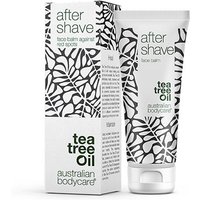 After shave balm tube with black leaf design, labeled "tea tree oil," next to matching box, 100ml by Australian Bodycare.