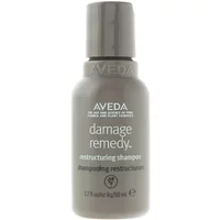 Gray Aveda Damage Remedy Restructuring Shampoo 50ml bottle with white text and flip-top cap.