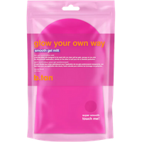 Pink b.tan Glow Your Own Way Smooth Gel Mitt in clear packaging with yellow and white text.
