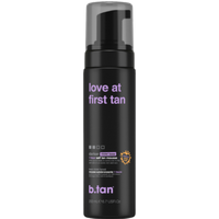 Black b.tan Love At First Tan Tanning Mousse bottle, 200 ml, with purple text and clear cap.
