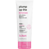 White b.tan Plump Up The Bronze Gradual Tan Lotion tube with pink cap, 236ml, featuring bold black and pink text.